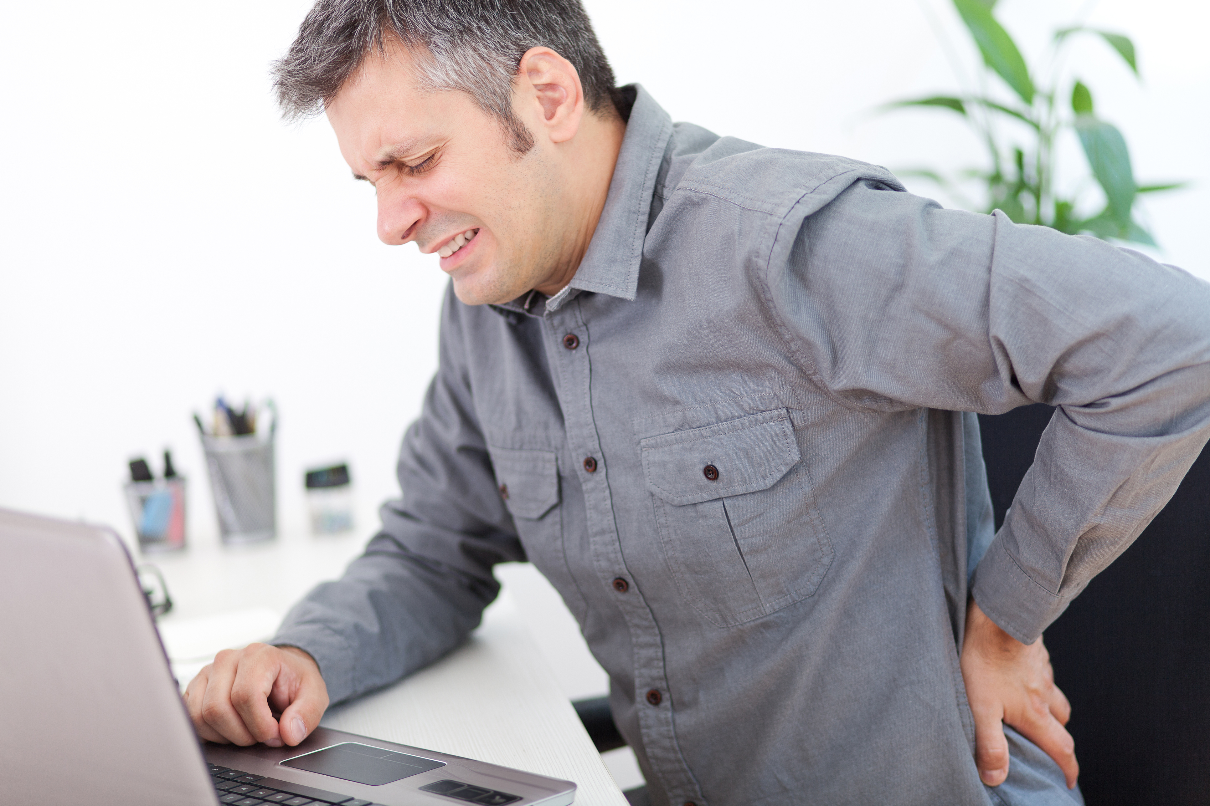 Man with bad computer posture